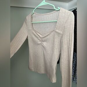 FREE WITH A PURCHASE Long sleeve cream top